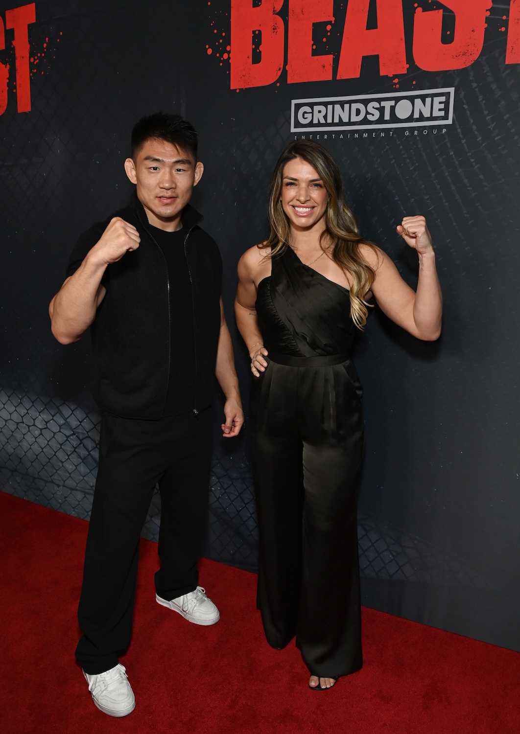INGLEWOOD, CALIFORNIA - APRIL 08: (L-R) Song Yadong and Mackenzie Dern attend "Beast" Los Angeles Special Screening at Cosm Los Angeles on April 08, 2026 in Inglewood, California. (Photo by Jon Kopaloff/Getty Images for Lionsgate/Grindstone)