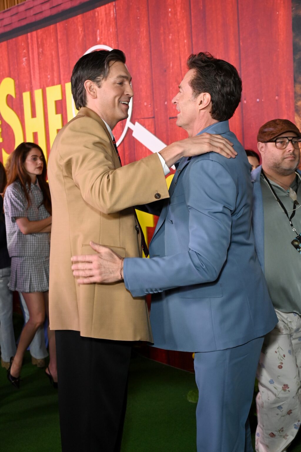 NEW YORK, NEW YORK - APRIL 19: (L-R) Nicholas Braun and Hugh Jackman greet each other as they attend NY Red Carpet and Premiere of Amazon MGM Studio's "The Sheep Detectives" at Jazz at Lincoln Center on April 19, 2026 in New York City. (Photo by Bryan Bedder/Getty Images for Amazon MGM)