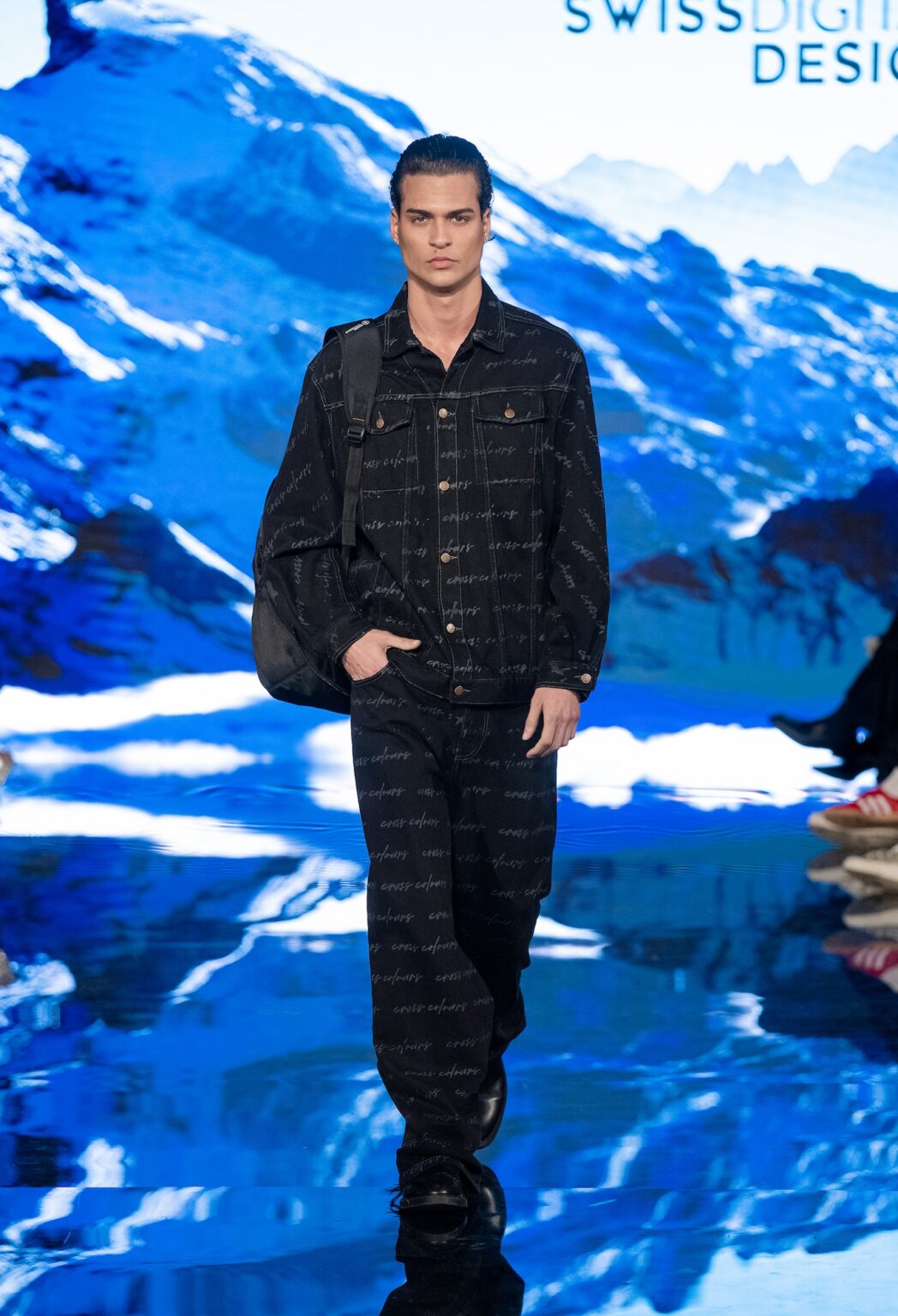 LOS ANGELES, CALIFORNIA - MARCH 13: A model walks the runway at the Swiss Digital Design show during Los Angeles Fashion Week Powered By Art Hearts Fashion at The Majestic on March 13, 2026 in Los Angeles, California. (Photo by Mark Gunter/Getty Images for Art Hearts Fashion)