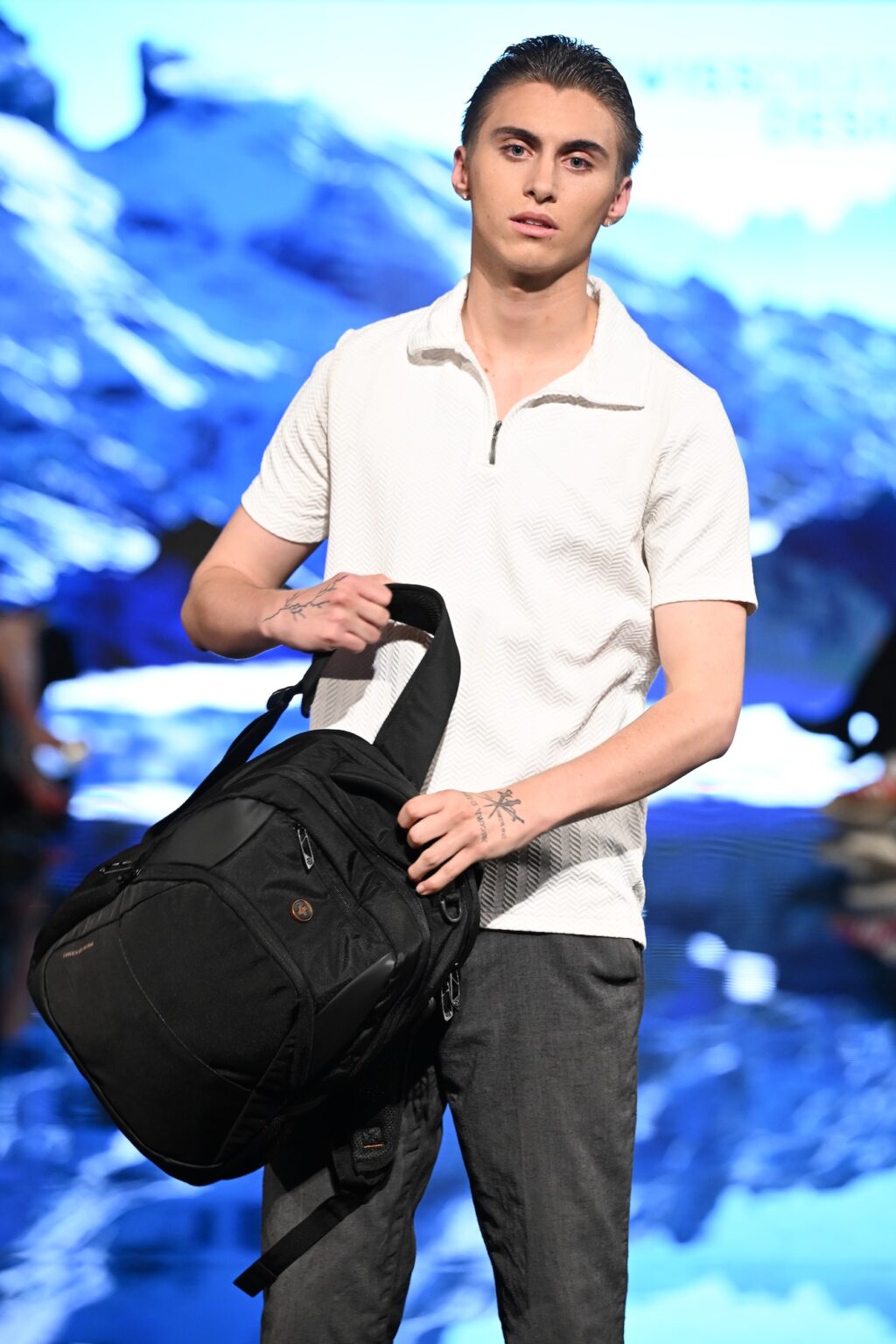 LOS ANGELES, CALIFORNIA - MARCH 13: A model walks the runway at the Swiss Digital Design show during Los Angeles Fashion Week Powered By Art Hearts Fashion at The Majestic on March 13, 2026 in Los Angeles, California. (Photo by Mark Gunter/Getty Images for Art Hearts Fashion)