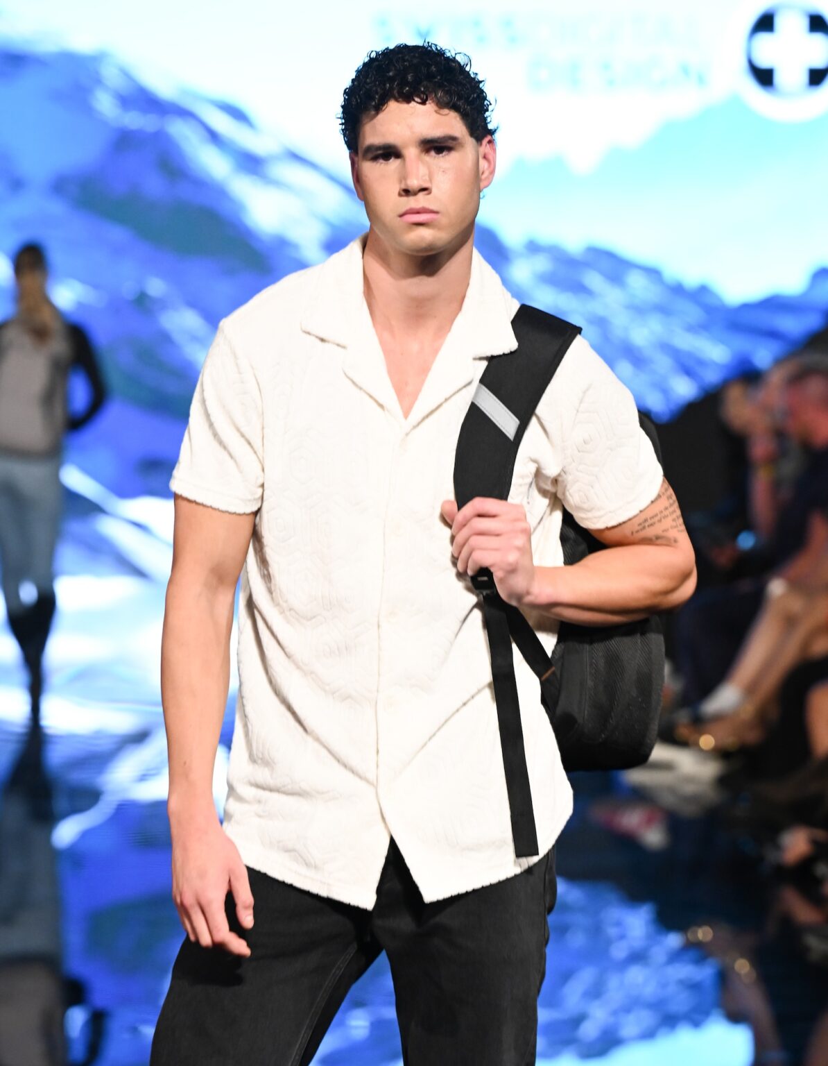 LOS ANGELES, CALIFORNIA - MARCH 13: A model walks the runway at the Swiss Digital Design show during Los Angeles Fashion Week Powered By Art Hearts Fashion at The Majestic on March 13, 2026 in Los Angeles, California. (Photo by Mark Gunter/Getty Images for Art Hearts Fashion)
