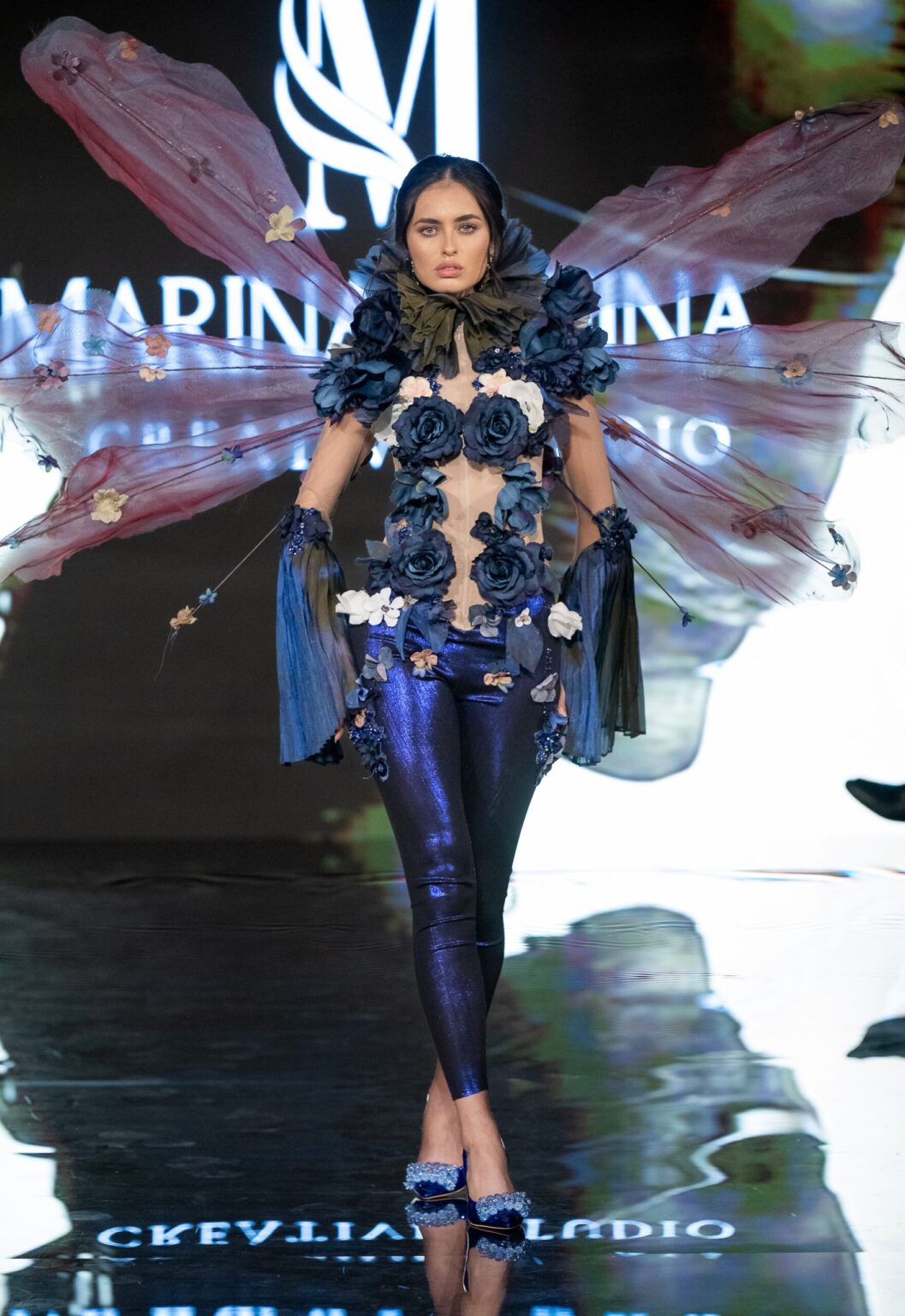 LOS ANGELES, CALIFORNIA - MARCH 13: A model walks the runway at the Marina Safina show during Los Angeles Fashion Week Powered By Art Hearts Fashion at The Majestic on March 13, 2026 in Los Angeles, California. (Photo by Mark Gunter/Getty Images for Art Hearts Fashion)