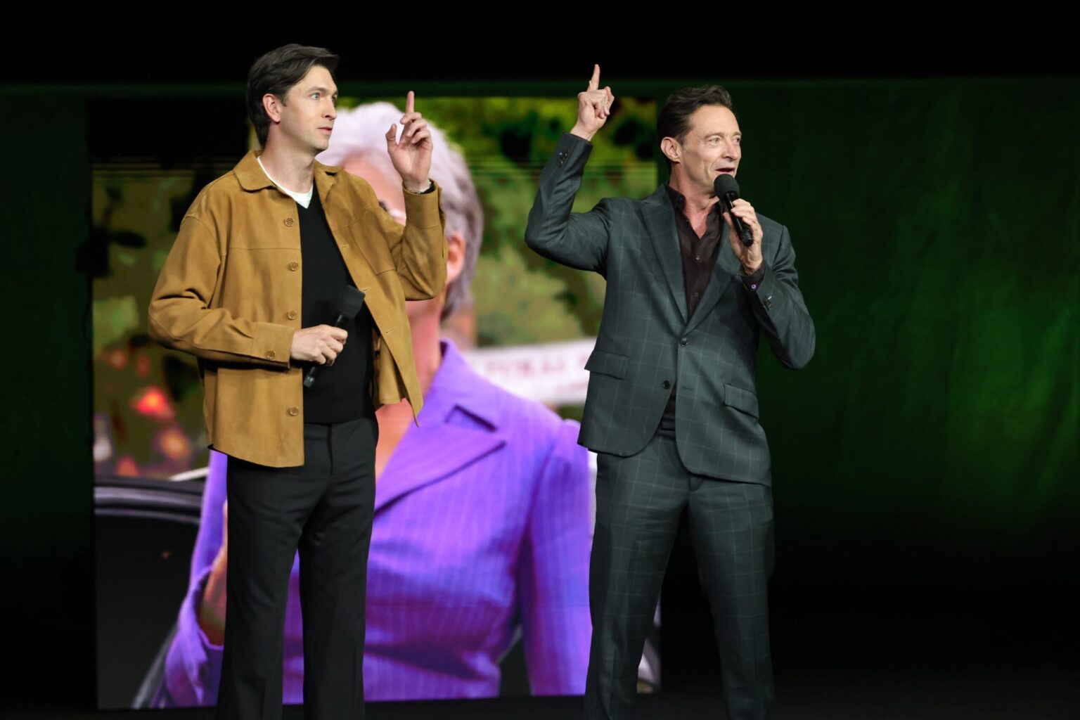 LAS VEGAS, NEVADA - APRIL 15: Nicholas Braun (L) and Hugh Jackman from "The Sheep Detectives" at the Amazon MGM Studios' CinemaCon 2026 Presentation at The Colosseum at Caesars Palace on April 15, 2026 in Las Vegas, Nevada. (Photo by Stewart Cook/Amazon MGM Studios via Getty Images)