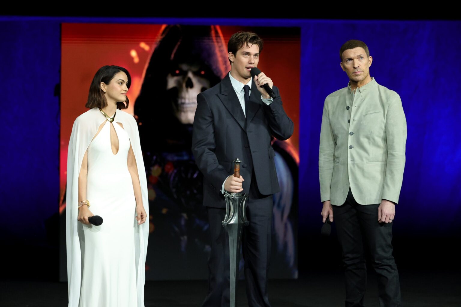 LAS VEGAS, NEVADA - APRIL 15: (L-R) Camila Mendes, Nicholas Galitzine and Travis Knight from "Masters of the Universe" at the Amazon MGM Studios' CinemaCon 2026 Presentation at The Colosseum at Caesars Palace on April 15, 2026 in Las Vegas, Nevada. (Photo by Stewart Cook/Amazon MGM Studios via Getty Images)