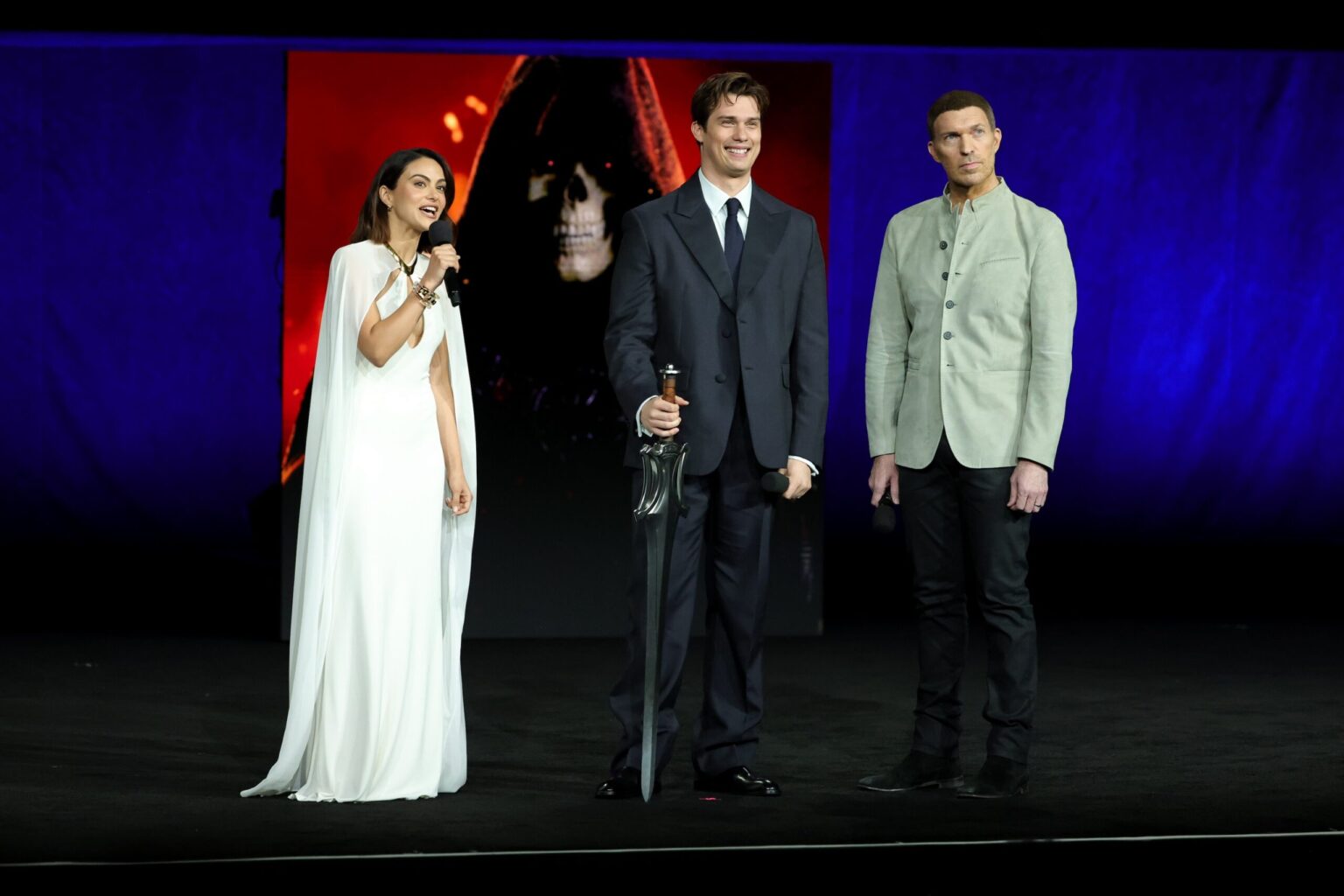 LAS VEGAS, NEVADA - APRIL 15: (L-R) Camila Mendes, Nicholas Galitzine and Travis Knight from "Masters of the Universe" at the Amazon MGM Studios' CinemaCon 2026 Presentation at The Colosseum at Caesars Palace on April 15, 2026 in Las Vegas, Nevada. (Photo by Stewart Cook/Amazon MGM Studios via Getty Images)