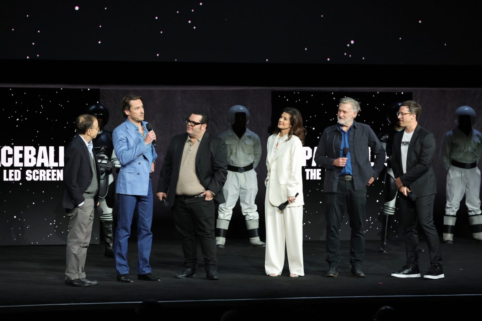 LAS VEGAS, NEVADA - APRIL 15: (L-R) Rick Moranis, Lewis Pullman, Josh Gad, Daphne Zuniga, Bill Pullman and Josh Greenbaum from "Spaceballs The New One" at the Amazon MGM Studios' CinemaCon 2026 Presentation at The Colosseum at Caesars Palace on April 15, 2026 in Las Vegas, Nevada. (Photo by Stewart Cook/Amazon MGM Studios via Getty Images)