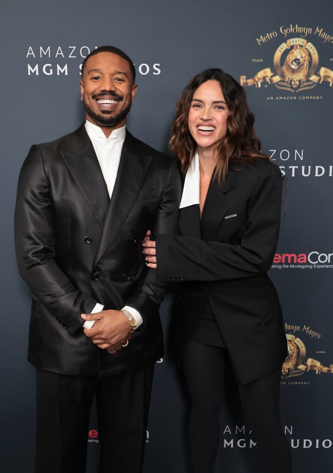 LAS VEGAS, NEVADA - APRIL 15: Michael B. Jordan (L) and Adria Arjona from "The Thomas Crown Affair" at the Amazon MGM Studios' CinemaCon 2026 Presentation at The Colosseum at Caesars Palace on April 15, 2026 in Las Vegas, Nevada. (Photo by Eric Charbonneau/Amazon MGM Studios via Getty Images)