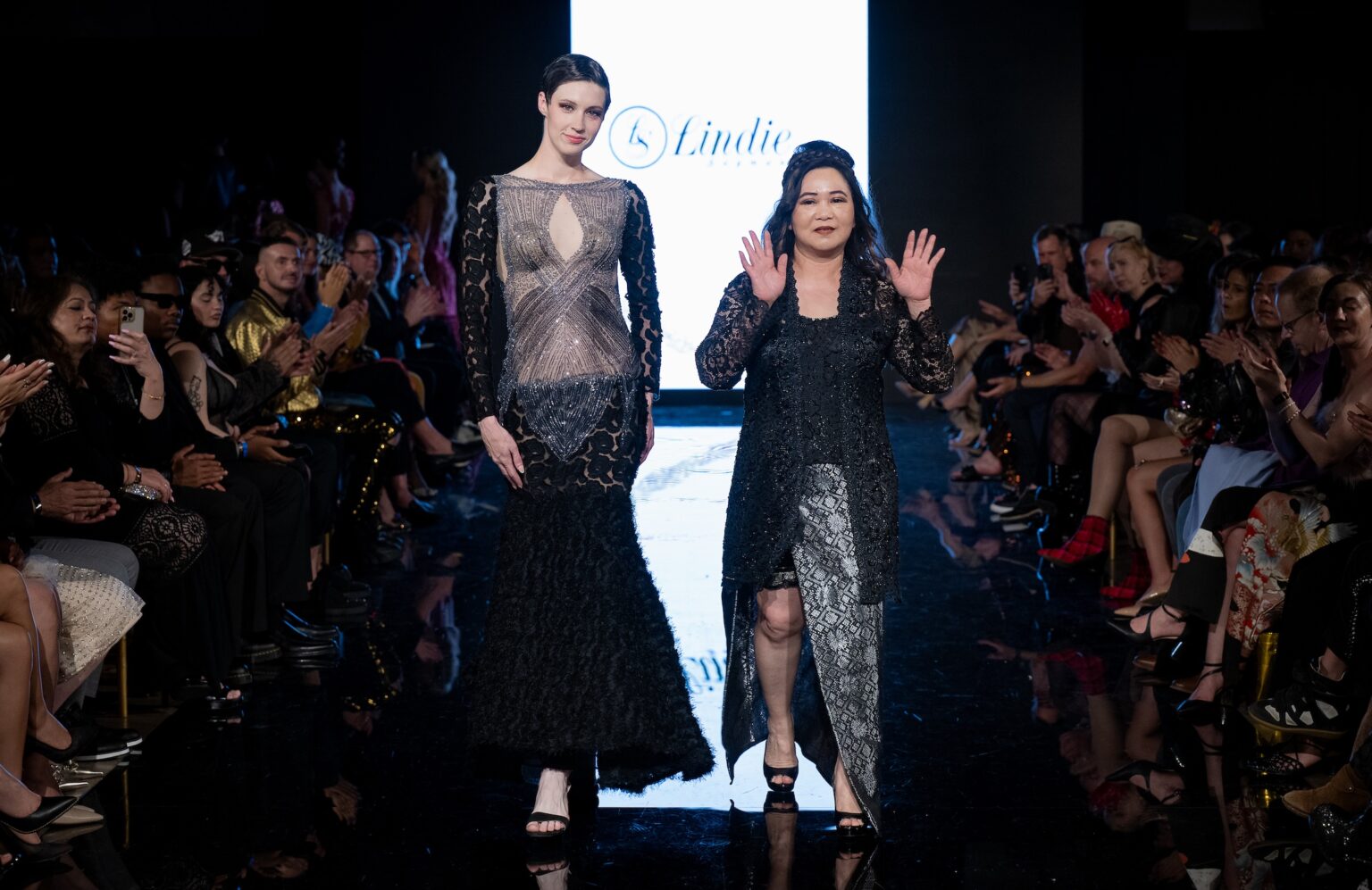 LOS ANGELES, CALIFORNIA - MARCH 14: Designer and model walk the runway at the Lindisssh show during Los Angeles Fashion Week Powered By Art Hearts Fashion at The Majestic on March 14, 2026 in Los Angeles, California. (Photo by Mark Gunter/Getty Images for Art Hearts Fashion)