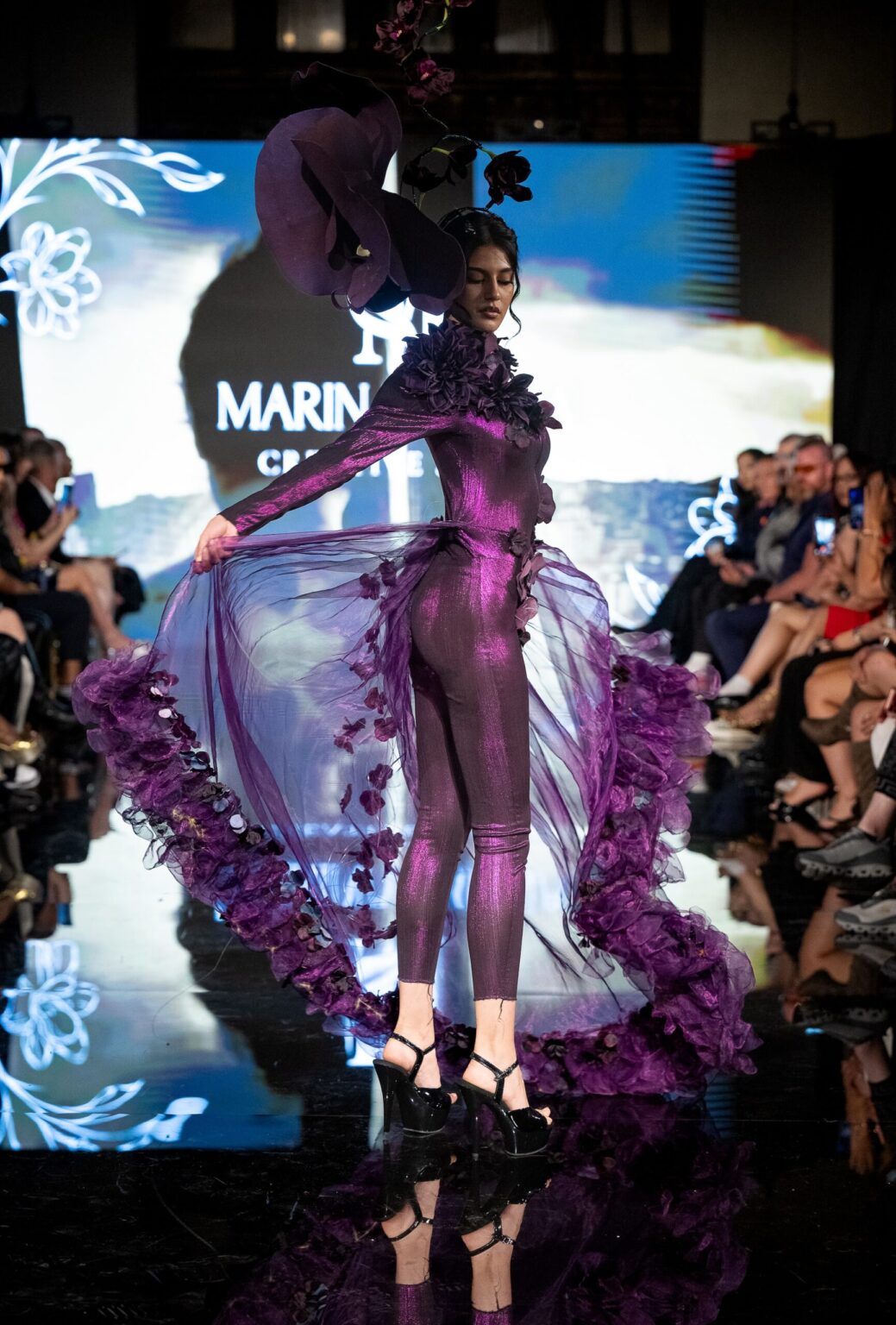 LOS ANGELES, CALIFORNIA - MARCH 13: A model walks the runway at the Marina Safina show during Los Angeles Fashion Week Powered By Art Hearts Fashion at The Majestic on March 13, 2026 in Los Angeles, California. (Photo by Mark Gunter/Getty Images for Art Hearts Fashion)