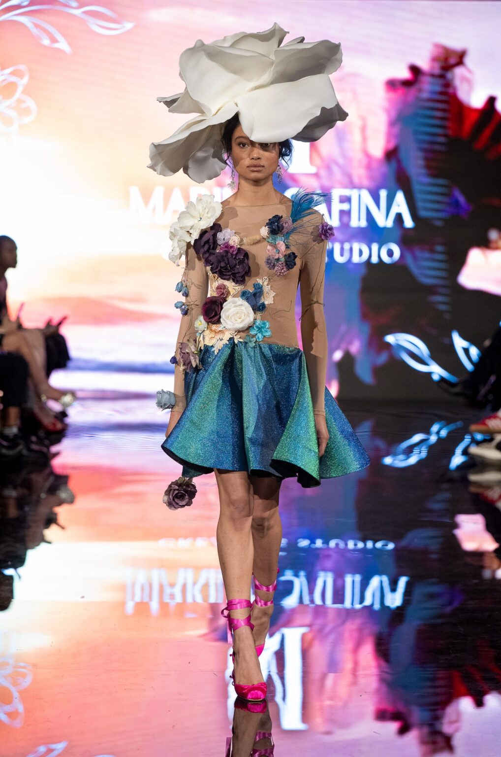 LOS ANGELES, CALIFORNIA - MARCH 13: A model walks the runway at the Marina Safina show during Los Angeles Fashion Week Powered By Art Hearts Fashion at The Majestic on March 13, 2026 in Los Angeles, California. (Photo by Mark Gunter/Getty Images for Art Hearts Fashion)