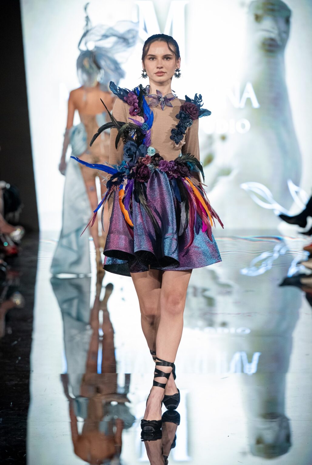 LOS ANGELES, CALIFORNIA - MARCH 13: A model walks the runway at the Marina Safina show during Los Angeles Fashion Week Powered By Art Hearts Fashion at The Majestic on March 13, 2026 in Los Angeles, California. (Photo by Mark Gunter/Getty Images for Art Hearts Fashion)