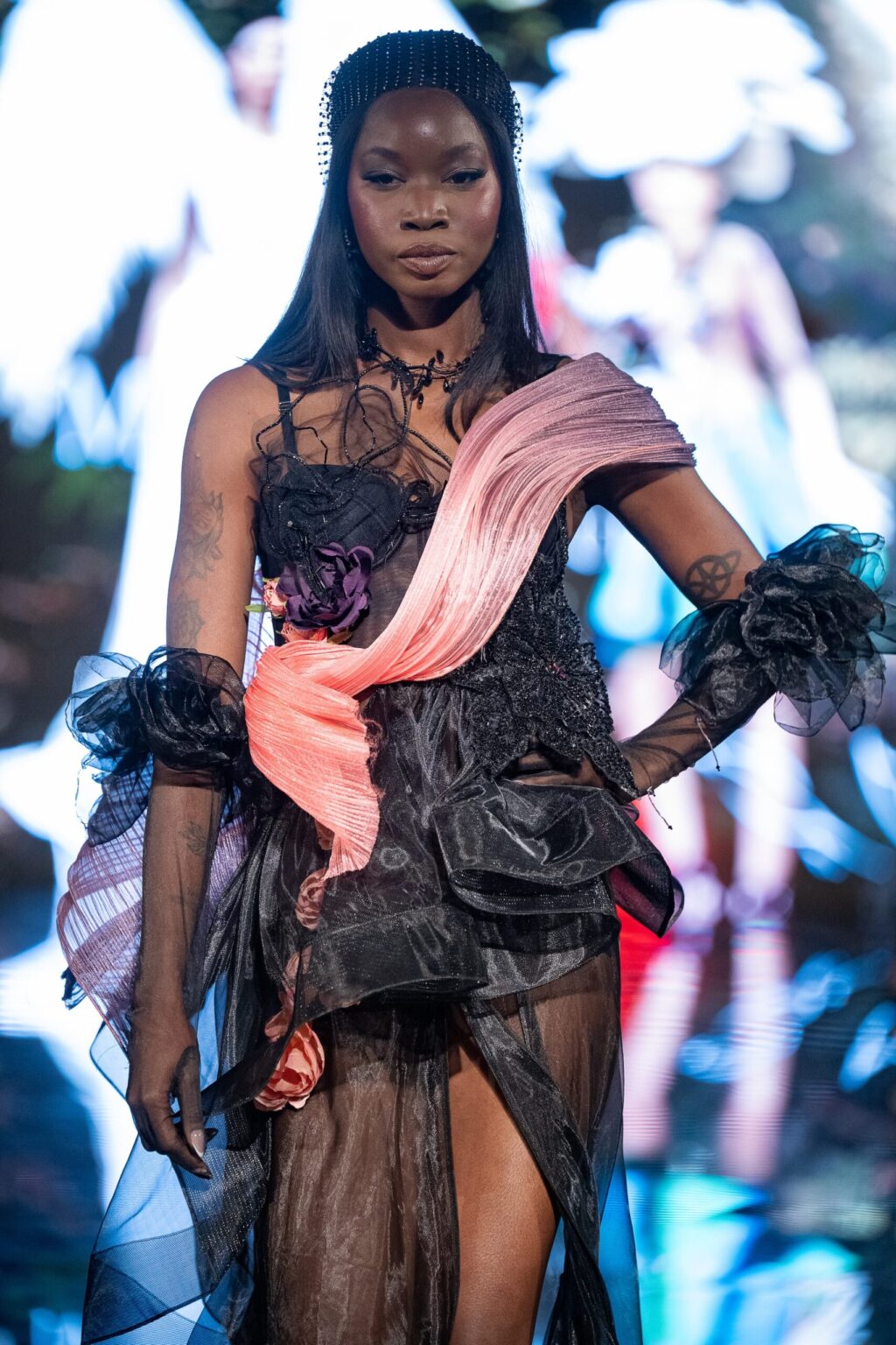 LOS ANGELES, CALIFORNIA - MARCH 13: A model walks the runway at the Marina Safina show during Los Angeles Fashion Week Powered By Art Hearts Fashion at The Majestic on March 13, 2026 in Los Angeles, California. (Photo by Mark Gunter/Getty Images for Art Hearts Fashion)