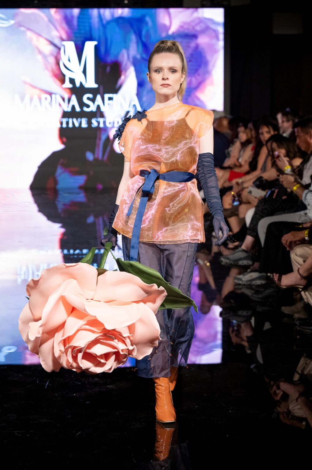 LOS ANGELES, CALIFORNIA - MARCH 13: A model walks the runway at the Marina Safina show during Los Angeles Fashion Week Powered By Art Hearts Fashion at The Majestic on March 13, 2026 in Los Angeles, California. (Photo by Mark Gunter/Getty Images for Art Hearts Fashion)