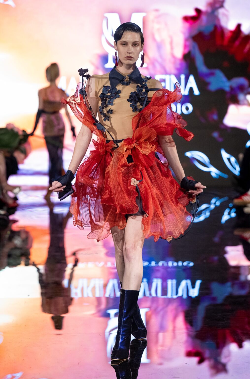 LOS ANGELES, CALIFORNIA - MARCH 13: A model walks the runway at the Marina Safina show during Los Angeles Fashion Week Powered By Art Hearts Fashion at The Majestic on March 13, 2026 in Los Angeles, California. (Photo by Mark Gunter/Getty Images for Art Hearts Fashion)