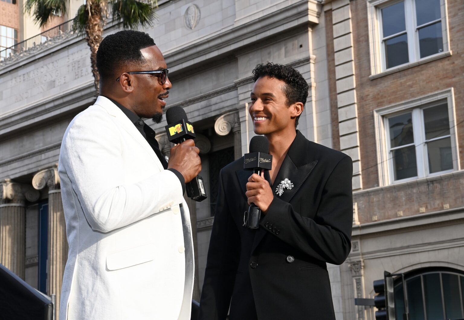 LOS ANGELES, CALIFORNIA - APRIL 20: (L-R) Bill Bellamy and Jaafar Jackson speak onstage during Lionsgate's "Michael" Los Angeles premiere at Dolby Theatre on April 20, 2026 in Los Angeles, California. (Photo by Jon Kopaloff/Getty Images for Lionsgate)