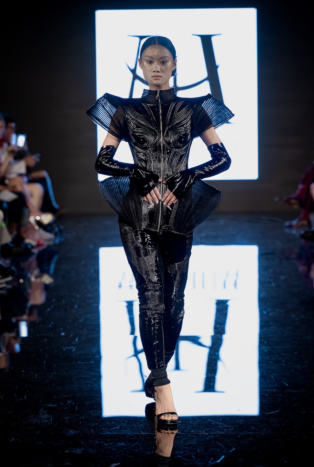 LOS ANGELES, CALIFORNIA - MARCH 13: A model walks the runway at the Morfium Fashion show during Los Angeles Fashion Week Powered By Art Hearts Fashion at The Majestic on March 13, 2026 in Los Angeles, California. (Photo by Mark Gunter/Getty Images for Art Hearts Fashion)