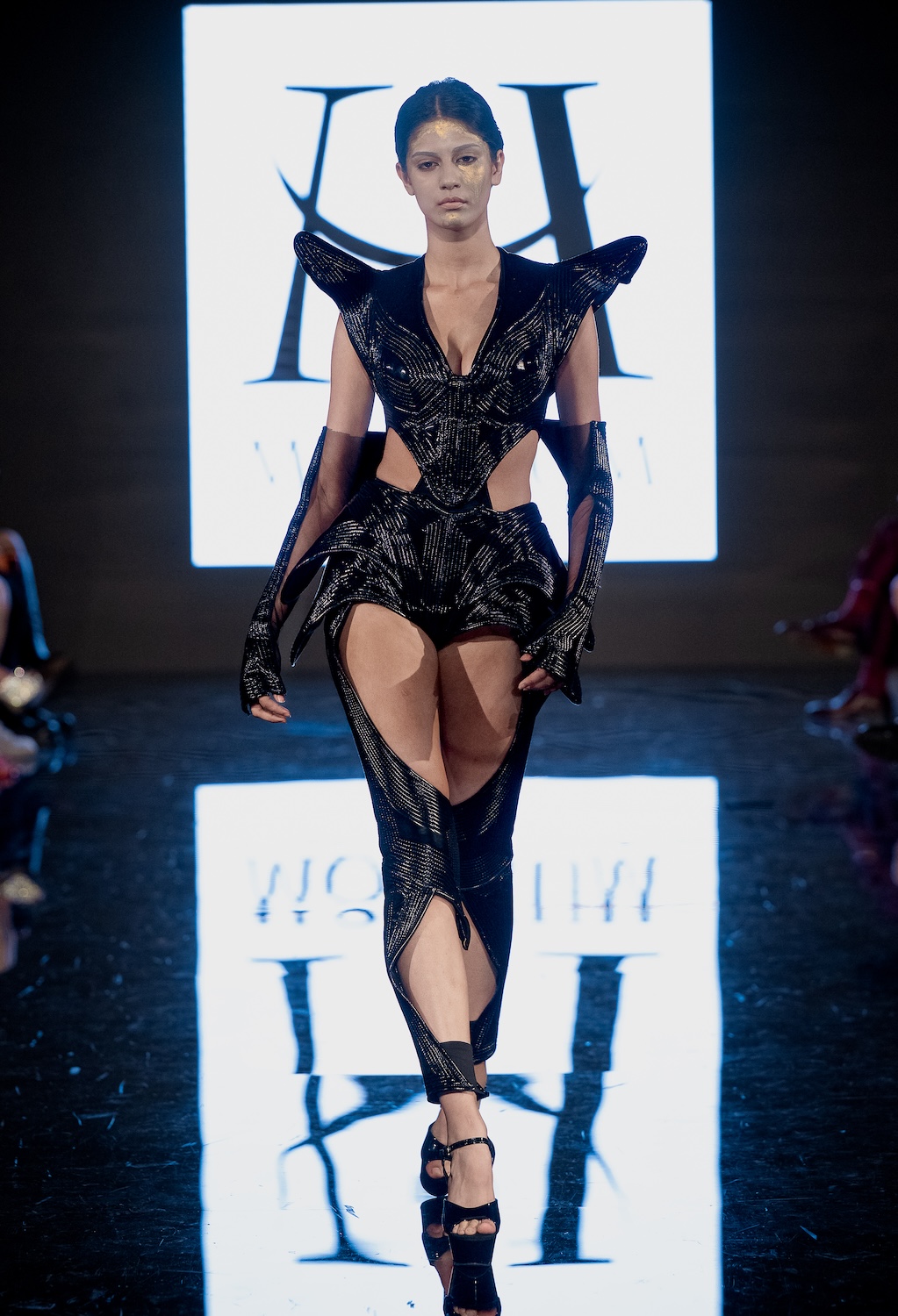 LOS ANGELES, CALIFORNIA - MARCH 13: A model walks the runway at the Morfium Fashion show during Los Angeles Fashion Week Powered By Art Hearts Fashion at The Majestic on March 13, 2026 in Los Angeles, California. (Photo by Mark Gunter/Getty Images for Art Hearts Fashion)