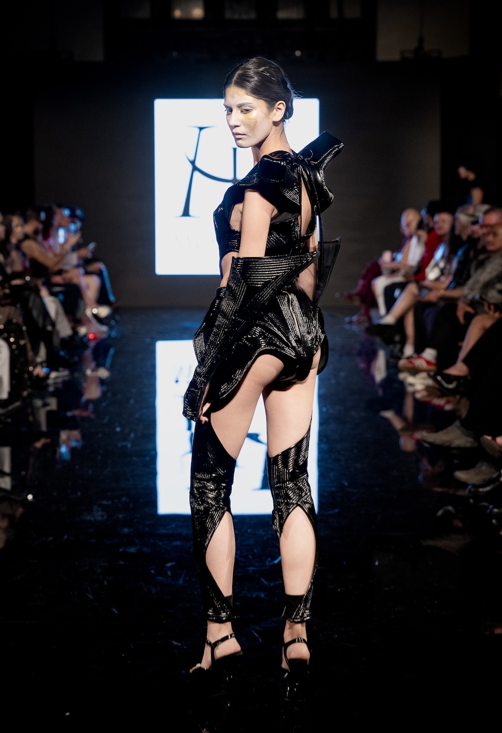LOS ANGELES, CALIFORNIA - MARCH 13: A model walks the runway at the Morfium Fashion show during Los Angeles Fashion Week Powered By Art Hearts Fashion at The Majestic on March 13, 2026 in Los Angeles, California. (Photo by Mark Gunter/Getty Images for Art Hearts Fashion)
