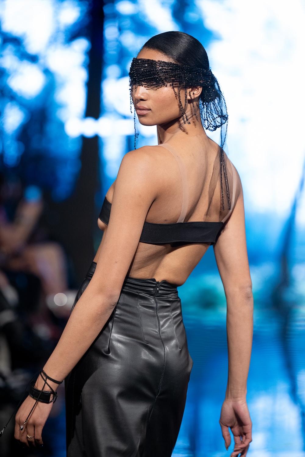 LOS ANGELES, CALIFORNIA - MARCH 13: A model walks the runway at the Scathed Fashion show during Los Angeles Fashion Week Powered By Art Hearts Fashion at The Majestic on March 13, 2026 in Los Angeles, California. (Photo by Mark Gunter/Getty Images for Art Hearts Fashion)