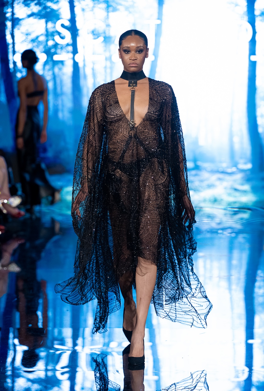 LOS ANGELES, CALIFORNIA - MARCH 13: A model walks the runway at the Scathed Fashion show during Los Angeles Fashion Week Powered By Art Hearts Fashion at The Majestic on March 13, 2026 in Los Angeles, California. (Photo by Mark Gunter/Getty Images for Art Hearts Fashion)