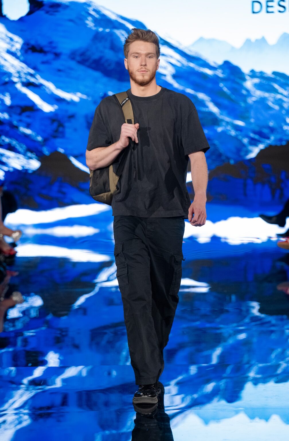 LOS ANGELES, CALIFORNIA - MARCH 13: A model walks the runway at the Swiss Digital Design show during Los Angeles Fashion Week Powered By Art Hearts Fashion at The Majestic on March 13, 2026 in Los Angeles, California. (Photo by Mark Gunter/Getty Images for Art Hearts Fashion)