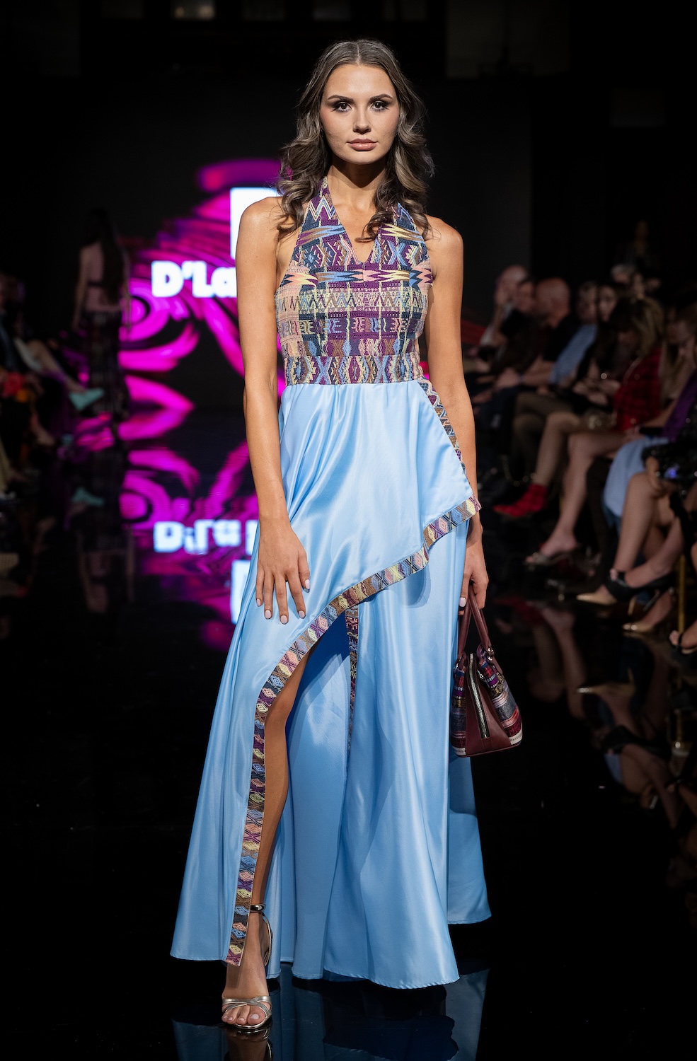 LOS ANGELES, CALIFORNIA - MARCH 14: A model walks the runway at the Textiles D' La Rossa show during Los Angeles Fashion Week Powered By Art Hearts Fashion at The Majestic on March 14, 2026 in Los Angeles, California. (Photo by Mark Gunter/Getty Images for Art Hearts Fashion)