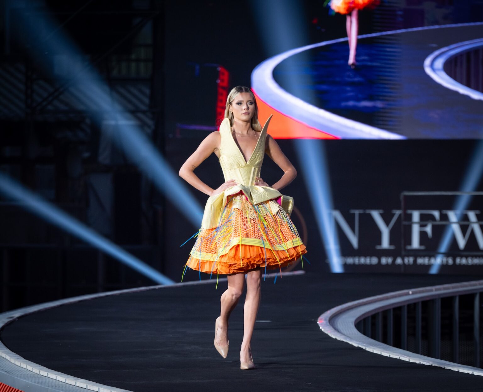 WUXI, CHINA - MARCH 19: Model Kalista Ganz walks the runway at the Merlin Castell show during Art Hearts Fashion Wuxi China at Smile Square Nianhua Bay on March 19, 2026 in Wuxi Jiangsu Province, China. (Photo by Mark Gunter/Getty Images for Art Hearts Fashion)
