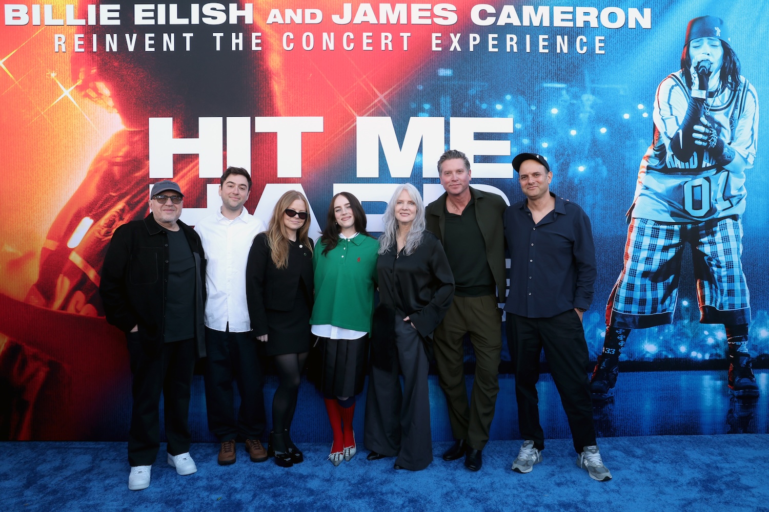 LOS ANGELES, CALIFORNIA - MAY 06: (L-R) Steve Berman, Justin Lubiner, Chelsea Dodson, Billie Eilish, Maggie Baird, Jason Owen and John Janick attend the "Billie Eilish Hit Me Hard and Soft: The Tour Live in 3D" US Premiere at the Historic Village Theatre on May 06, 2026, in Los Angeles, California. (Photo by Phillip Faraone/Getty Images for Paramount Pictures)