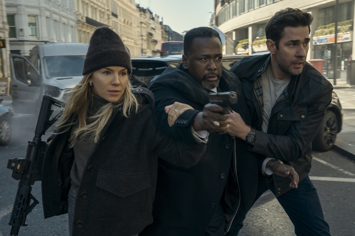 Emma Marlowe (Sienna Miller), James Greer (Wendell Pierce) , and Jack Ryan (John Krasinski) in TOM CLANCY'S JACK RYAN: GHOST WAR Photo Credit: Jonny Cournoyer / Prime Video © Amazon Content Services LLC