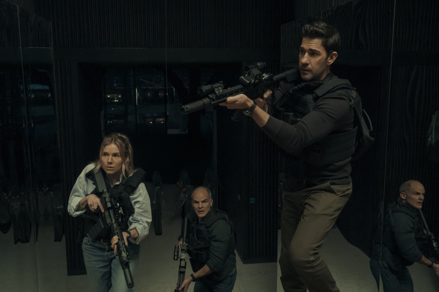 Emma Marlowe (Sienna Miller), Mike November (Michael Kelly), and Jack Ryan (John Krasinski) in TOM CLANCY'S JACK RYAN: GHOST WAR Photo Credit: Jonny Cournoyer / Prime Video © Amazon Content Services LLC