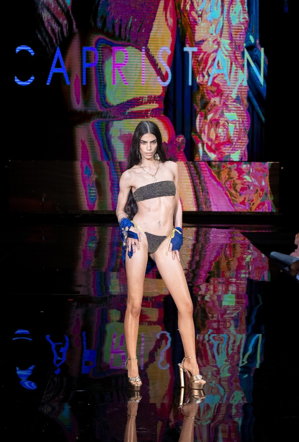MIAMI, FLORIDA - MAY 28: A model walks the runway at the Capristan show during Miami Swim Week Powered By Art Hearts Fashion at M2 MIAMI on May 28, 2026 in Miami, Florida. (Photo by Mark Gunter/Getty Images for Art Hearts Fashion)