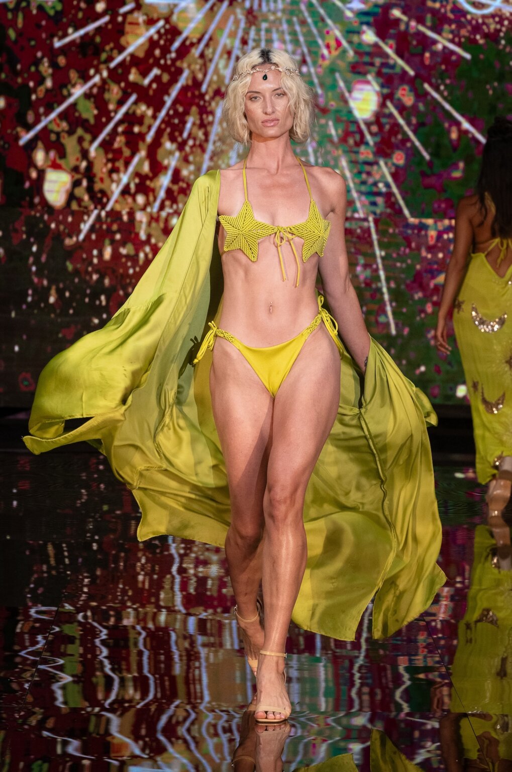 MIAMI, FLORIDA - MAY 28: A model walks the runway at the Luxe Isle show during Miami Swim Week Powered By Art Hearts Fashion at M2 MIAMI on May 28, 2026 in Miami, Florida. (Photo by Mark Gunter/Getty Images for Art Hearts Fashion)