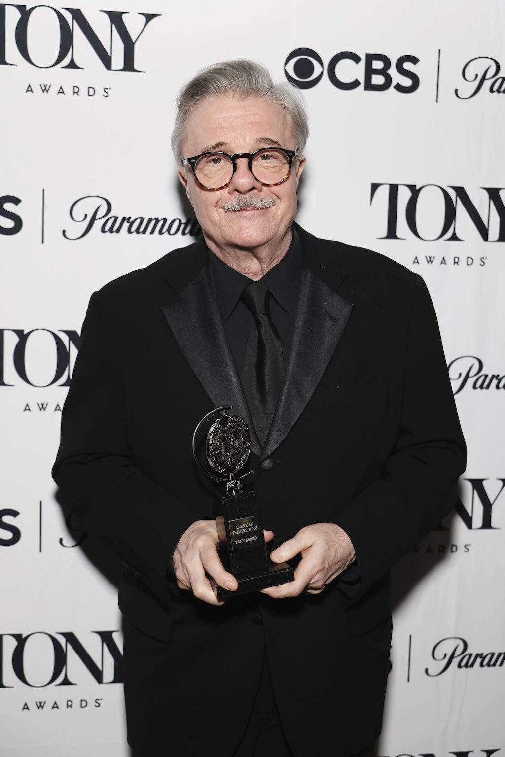 NEW YORK, NEW YORK - JUNE 07: Nathan Lane poses with the Best Revival of a Play award for Arthur Miller's Death of a Salesman alongside during The 79th Annual Tony Awards at Radio City Music Hall on June 07, 2026 in New York City. (Photo by Kevin Mazur/Getty Images for Tony Awards Productions)