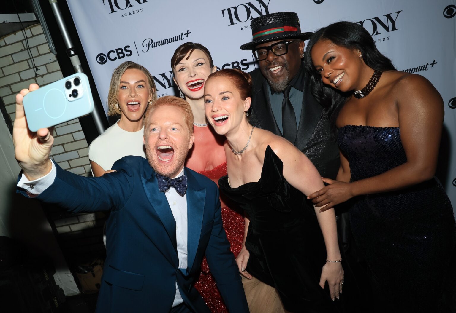 NEW YORK, NEW YORK - JUNE 07: (L-R) Julianne Hough, Jesse Tyler Ferguson, Dylan Mulvaney, Whitney Leavitt, Cedric the Entertainer and Adrienne Warren attend The 79th Annual Tony Awards at Radio City Music Hall on June 07, 2026 in New York City. (Photo by Jemal Countess/Getty Images for Tony Awards Productions)