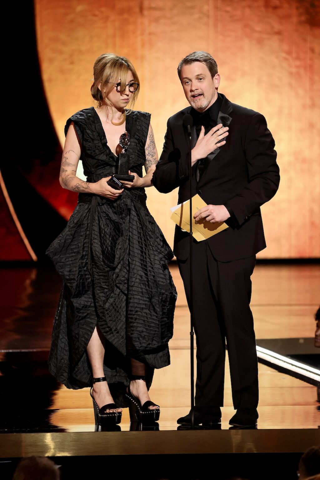 NEW YORK, NEW YORK - JUNE 07: (L-R) Jen Schriever and Michael Arden accept the Best Lighting Design of a Musical award for The Lost Boys onstage during The 79th Annual Tony Awards at Radio City Music Hall on June 07, 2026 in New York City. (Photo by Theo Wargo/Getty Images for Tony Awards Productions)