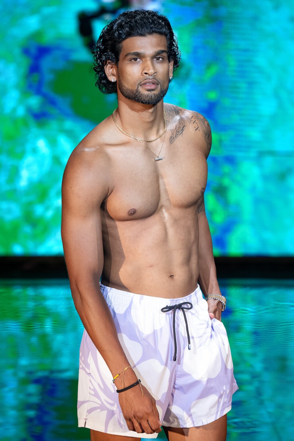 MIAMI, FLORIDA - MAY 29: A model walks the runway at the Sunlife Beachwear show during Miami Swim Week Powered By Art Hearts Fashion at M2 MIAMI on May 29, 2026 in Miami, Florida. (Photo by Mark Gunter/Getty Images for Art Hearts Fashion)