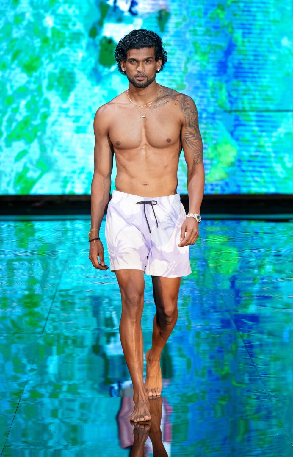 MIAMI, FLORIDA - MAY 29: A model walks the runway at the Sunlife Beachwear show during Miami Swim Week Powered By Art Hearts Fashion at M2 MIAMI on May 29, 2026 in Miami, Florida. (Photo by Mark Gunter/Getty Images for Art Hearts Fashion)