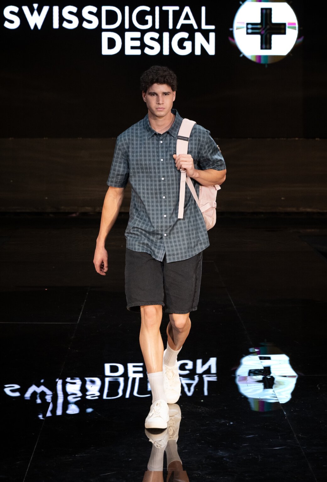 MIAMI, FLORIDA - MAY 29: A model walks the runway at the Swiss Digital Design show during Miami Swim Week Powered By Art Hearts Fashion at M2 MIAMI on May 29, 2026 in Miami, Florida. (Photo by Mark Gunter/Getty Images for Art Hearts Fashion)