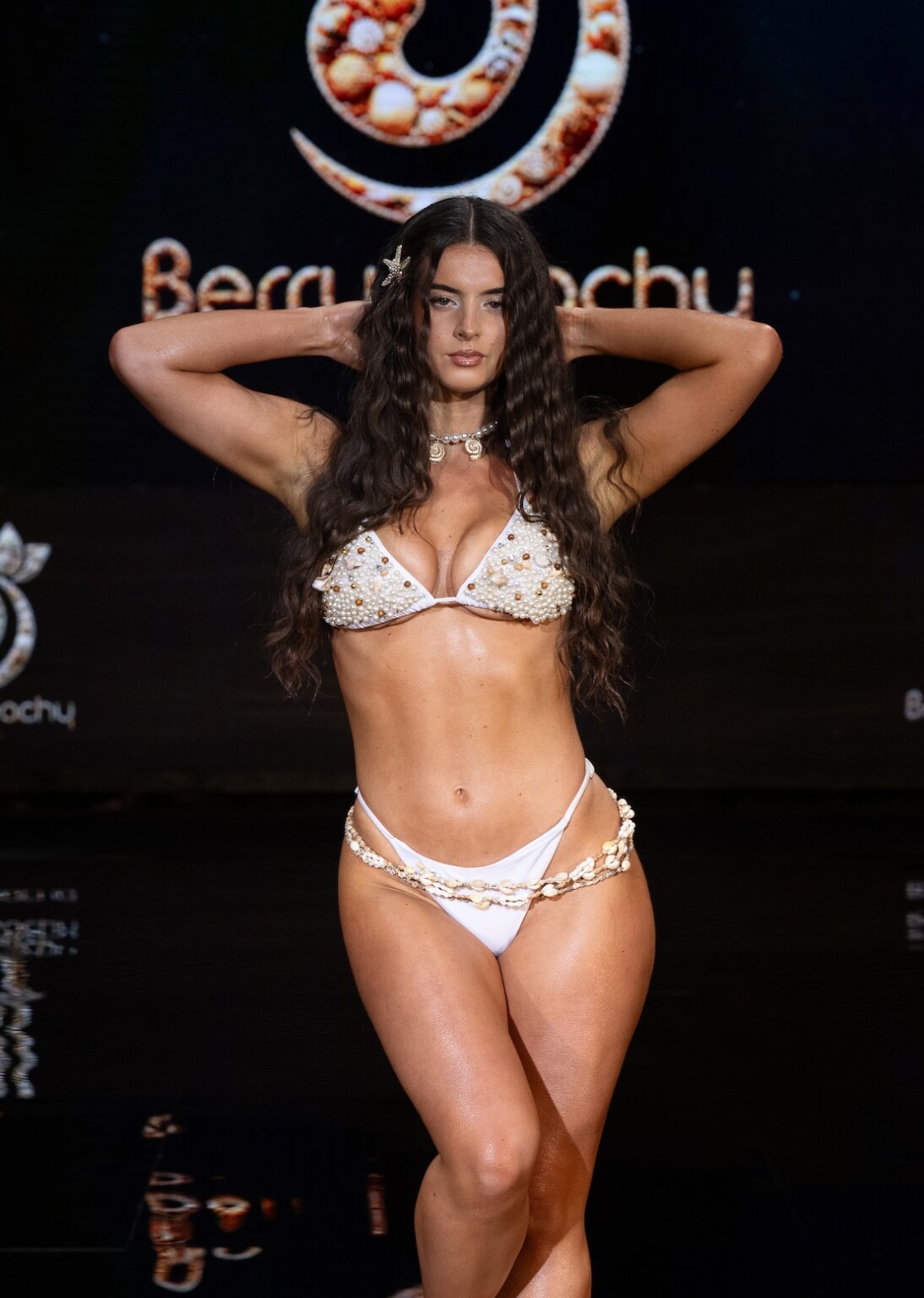 MIAMI, FLORIDA - MAY 28: A model walks the runway at the Berry Beachy Swimwear show during Miami Swim Week Powered By Art Hearts Fashion at M2 MIAMI on May 28, 2026 in Miami, Florida. (Photo by Mark Gunter/Getty Images for Art Hearts Fashion)
