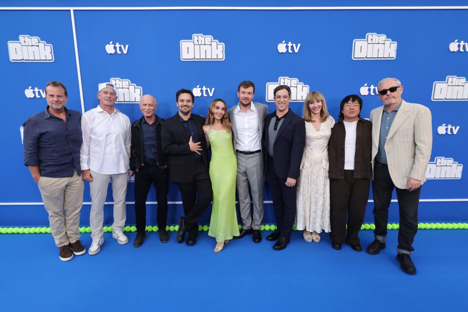 LOS ANGELES, CALIFORNIA - JULY 20: (L-R) Producer Rob Paris, producer Mike Witherill, Ed Harris, Jake Johnson, Chloe Fineman, witer/executive producer Sean Clements, director/executive producer Josh Greenbaum, Mary Steenburgen, Aaron Chen and producer John Lesher attend the global premiere of the upcoming Apple TV sports comedy “The Dink” at The Atrium at Westfield Century City on July 20, 2026 in Los Angeles, California. “The Dink” streams globally on Apple TV on Friday, July 24, 2026. (Photo by Eric Charbonneau/Apple TV via Getty Images)