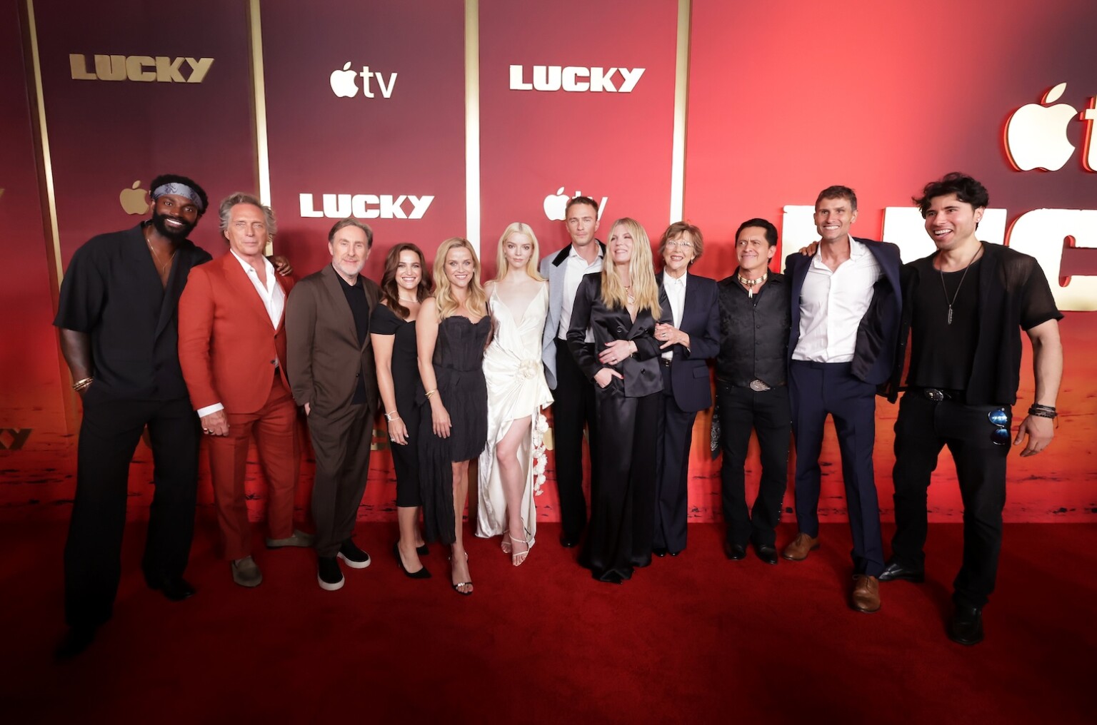 LOS ANGELES, CALIFORNIA - JULY 13: (L-R) Mo McRae, William Fichtner, co-showrunner/writer/executive producer Jonathan Tropper, executive producer Lauren Levy Neustadter, executive producer Reese Witherspoon, executive producer Anya Taylor-Joy, Drew Starkey, co-showrunner/executive producer Cassie Pappas, Annette Bening, Clifton Collins Jr., director/executive producer Jonathan van Tulleken and Artur Zai Barrera attend the global premiere of the upcoming Apple TV series “Lucky” at the Directors Guild of America on July 13, 2026 in Los Angeles, California. The series debuts globally on Apple TV on Wednesday, July 15, 2026. (Photo by Eric Charbonneau/Apple TV via Getty Images)