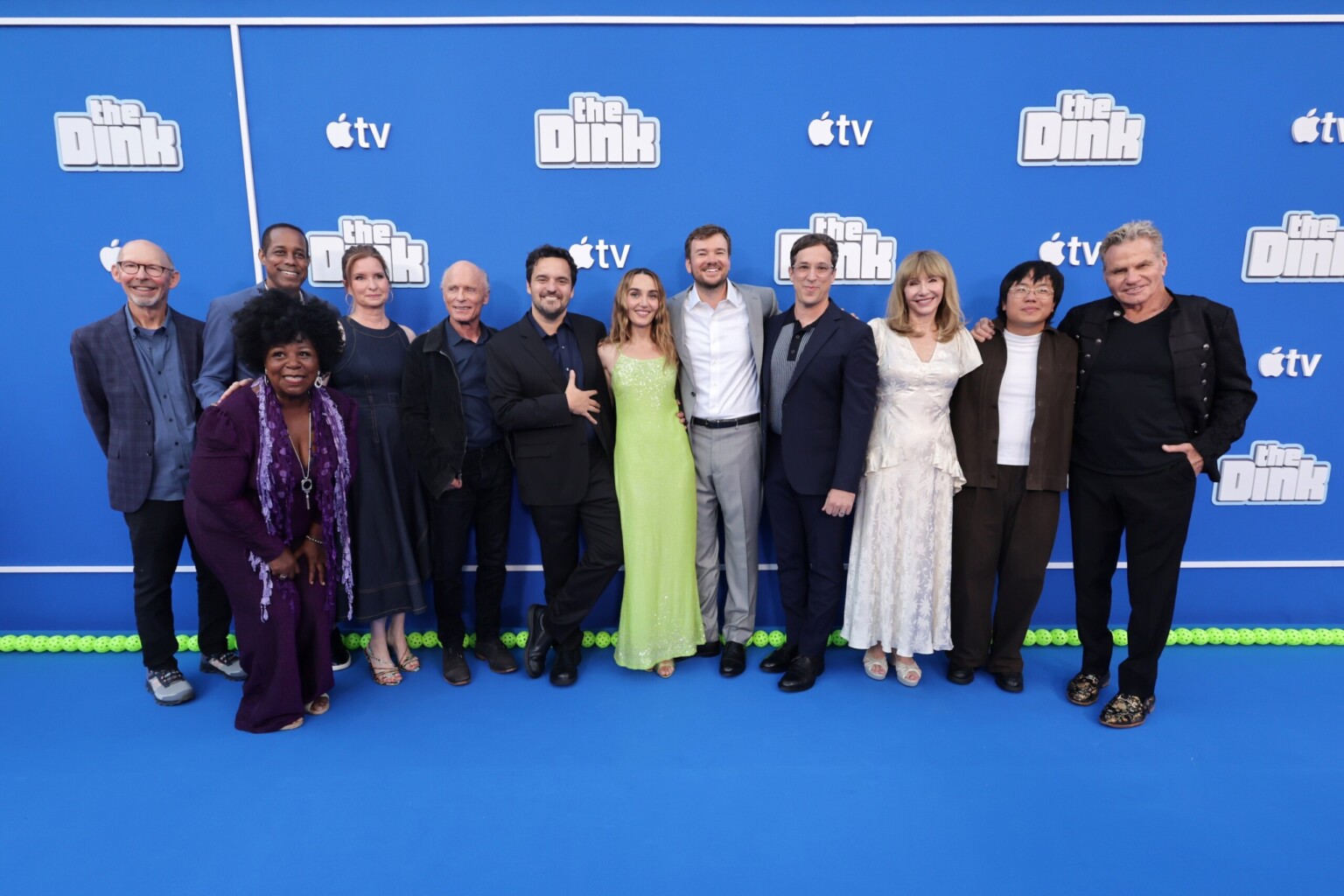 LOS ANGELES, CALIFORNIA - JULY 20: (L-R) Don Lake, Wayne Wilderson, Cleo King, Lennon Parham, Ed Harris, Jake Johnson, Chloe Fineman, witer/executive producer Sean Clements, director/executive producer Josh Greenbaum, Mary Steenburgen, Aaron Chen and Martin Kove attend the global premiere of the upcoming Apple TV sports comedy “The Dink” at The Atrium at Westfield Century City on July 20, 2026 in Los Angeles, California. “The Dink” streams globally on Apple TV on Friday, July 24, 2026. (Photo by Eric Charbonneau/Apple TV via Getty Images)