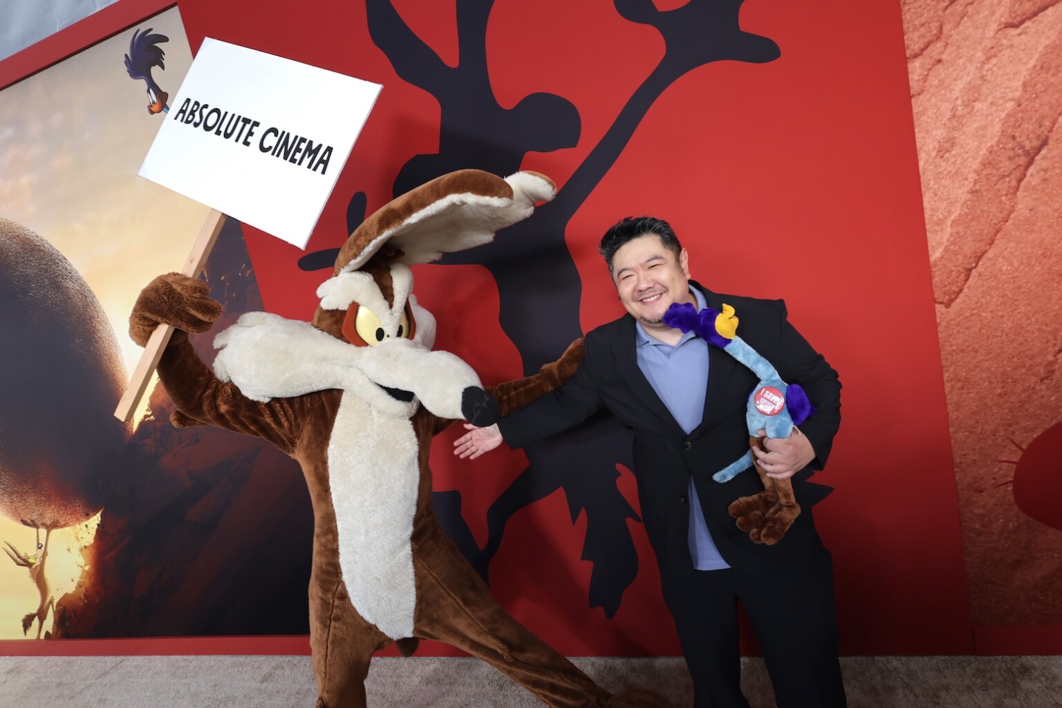 LOS ANGELES, CALIFORNIA - AUGUST 26: Wile E. Coyote (L) and Eric Bauza are seen at the Los Angeles Premiere of Ketchup Entertainment's "Coyote Vs Acme" at Westwood Village Theater on August 26, 2026 in Los Angeles, California. (Photo by Eric Charbonneau/Ketchup Entertainment via Getty Images)