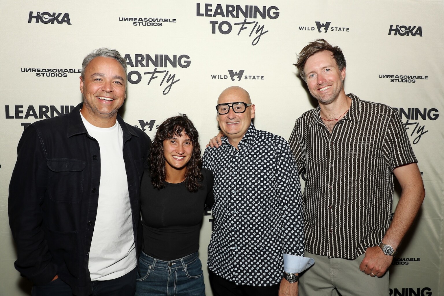 New York, New York - 8/18/26 - Evan Hayes (Producer), Aisha McAdams, Chris Albert Albert Media Group) and Max Lowe (Director) attends the New York Premiere of Unreasonable Studios’ “Learning To Fly” - PICTURED: Evan Hayes (Producer), Aisha McAdams, Chris Albert Albert Media Group) and Max Lowe (Director) - PHOTO by: Marion Curtis / StarPix for Unreasonable Studios - Location: Rooftop Screen, Pier 57