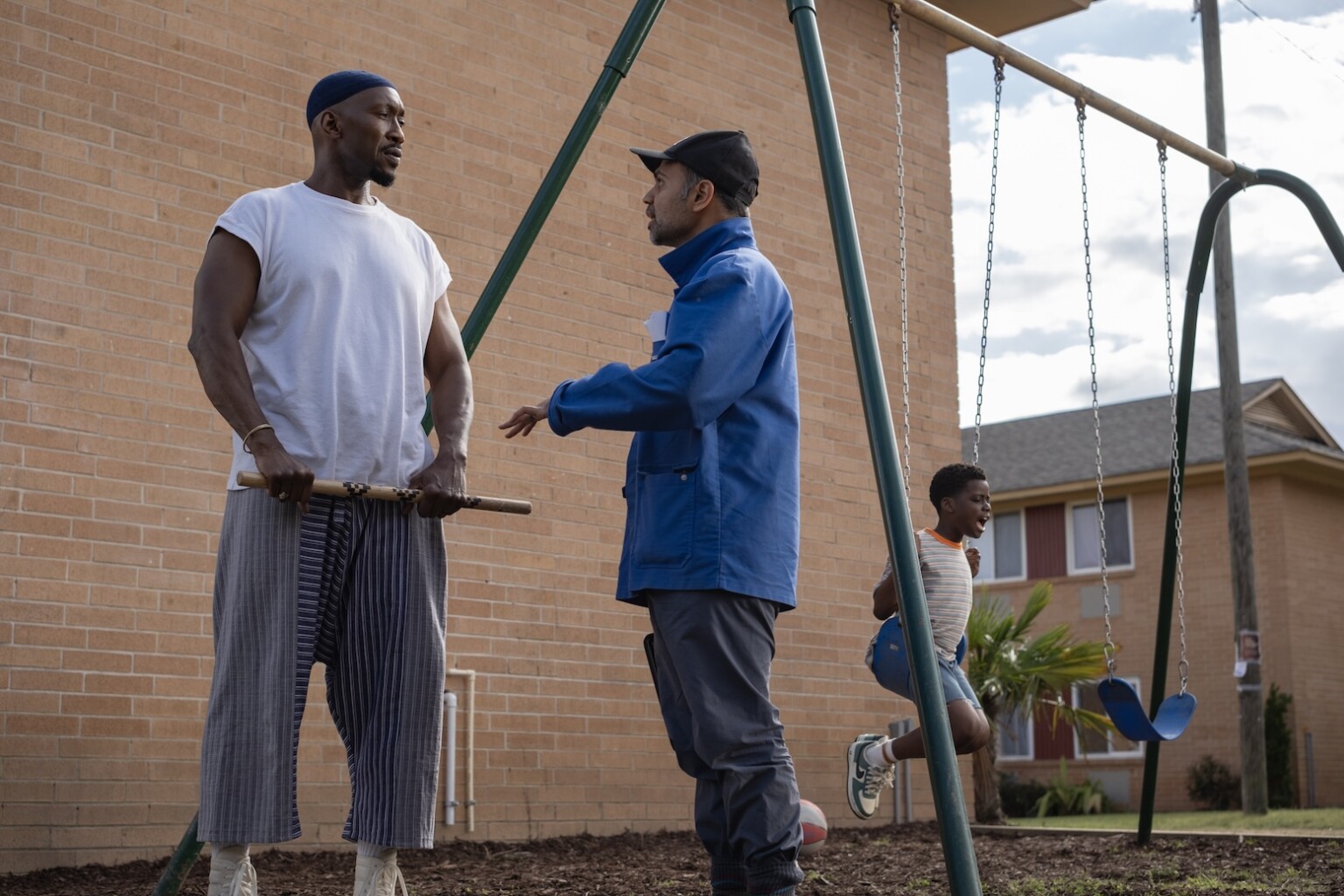 (L to R) Actor Mahershala Ali, director Bassam Tariq and actor Jahleel Kamara on the set of YOUR MOTHER YOUR MOTHER YOUR MOTHER, from Amazon MGM Studios. Photo Credit: Jaclyn Martinez © 2026 Amazon Content Services LLC. All Rights Reserved.