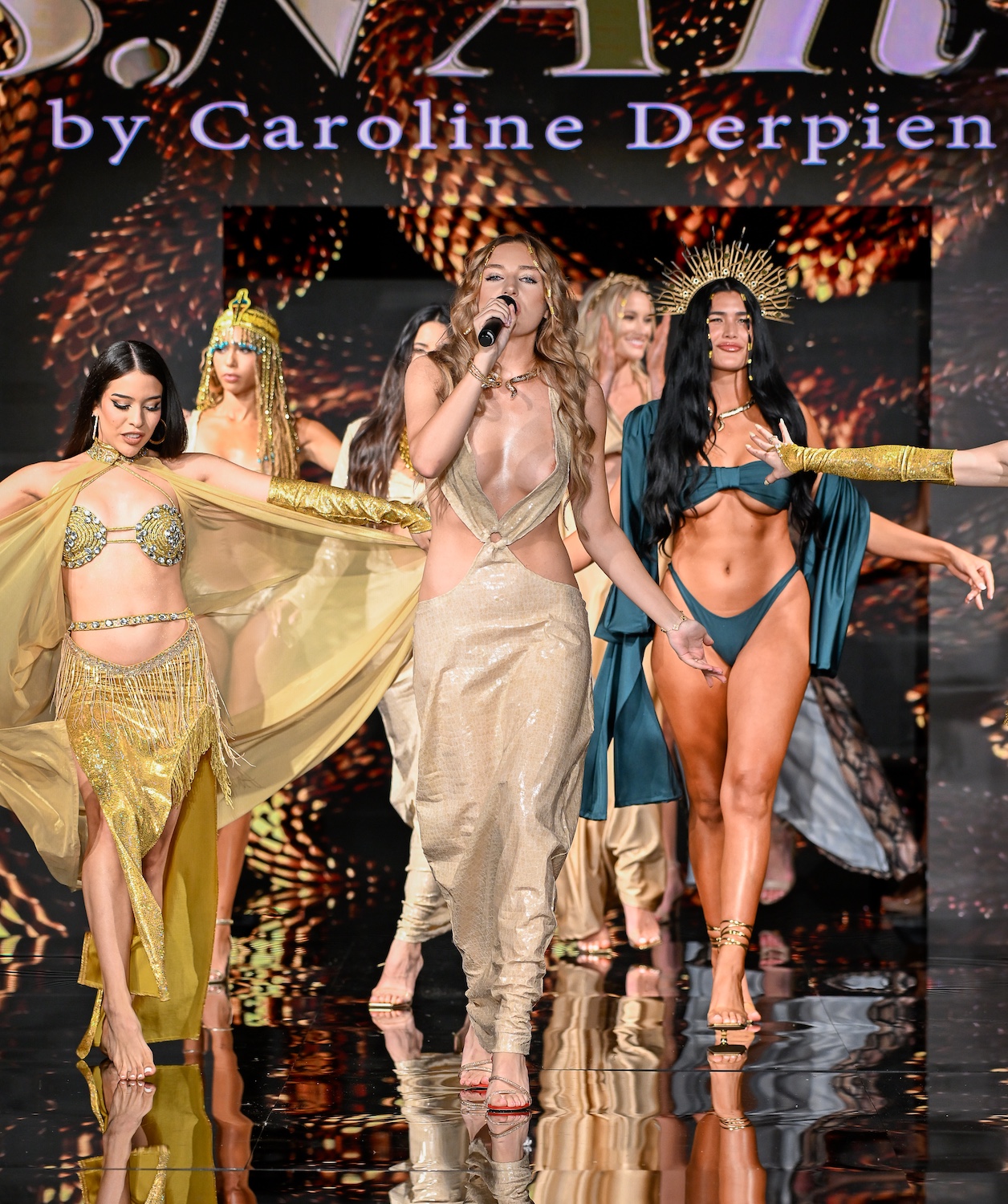 Singer and models walk the runway at the Caroline Derpienski show during Miami Swim Week Powered By Art Hearts Fashion at Eden Roc Hotel on May 31, 2025