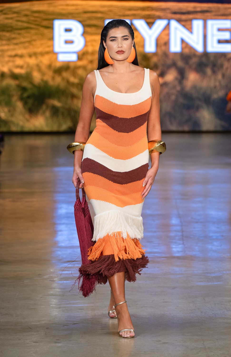 LOS ANGELES, CALIFORNIA - OCTOBER 18: A model walks the runway at the BFYNE show during Los Angeles Fashion Week Powered By Art Hearts Fashion at The New Mart on October 18, 2025 in Los Angeles, California. (Photo by Mark Gunter/Getty Images for Art Hearts Fashion)