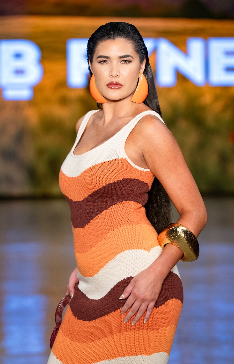 LOS ANGELES, CALIFORNIA - OCTOBER 18: A model walks the runway at the BFYNE show during Los Angeles Fashion Week Powered By Art Hearts Fashion at The New Mart on October 18, 2025 in Los Angeles, California. (Photo by Mark Gunter/Getty Images for Art Hearts Fashion)