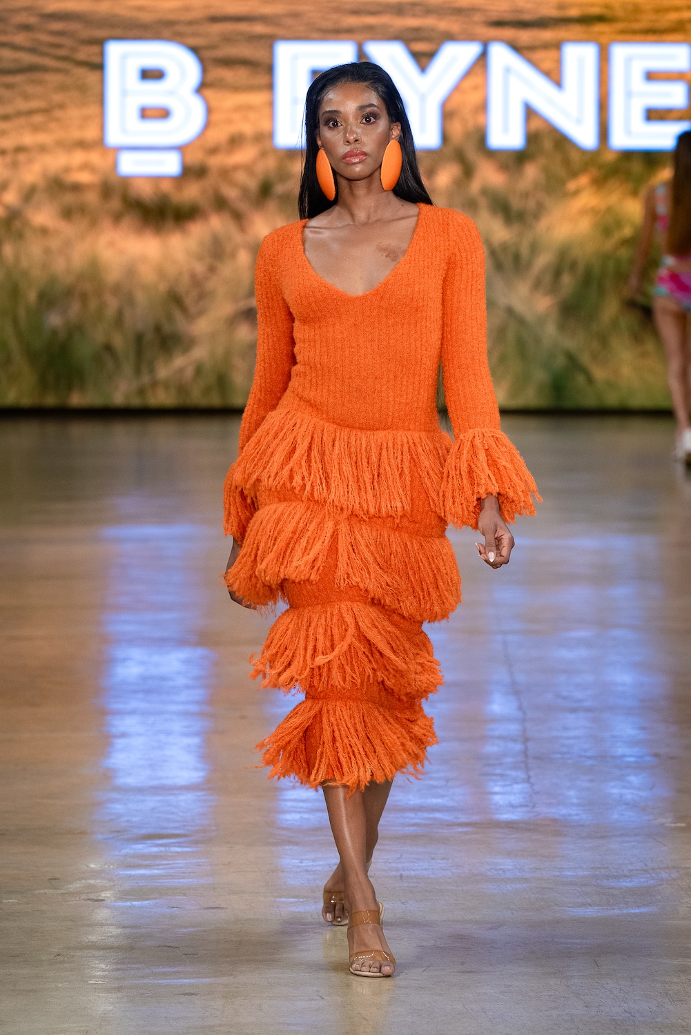 LOS ANGELES, CALIFORNIA - OCTOBER 18: A model walks the runway at the BFYNE show during Los Angeles Fashion Week Powered By Art Hearts Fashion at The New Mart on October 18, 2025 in Los Angeles, California. (Photo by Mark Gunter/Getty Images for Art Hearts Fashion)