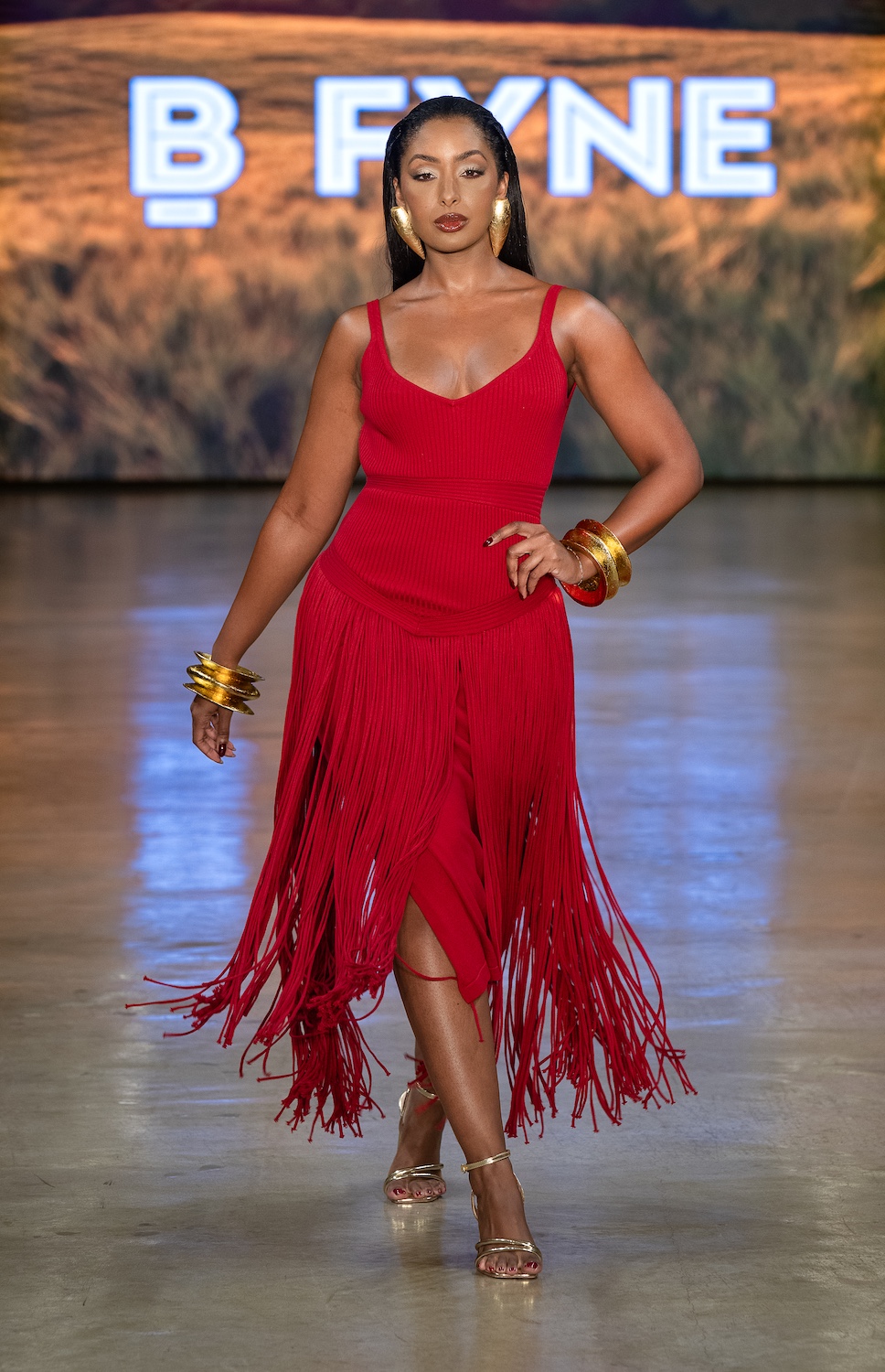 LOS ANGELES, CALIFORNIA - OCTOBER 18: A model walks the runway at the BFYNE show during Los Angeles Fashion Week Powered By Art Hearts Fashion at The New Mart on October 18, 2025 in Los Angeles, California. (Photo by Mark Gunter/Getty Images for Art Hearts Fashion)